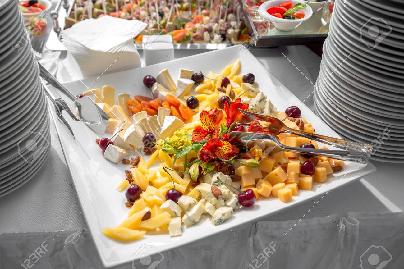 Banquet Table in restaurant served with different meals.